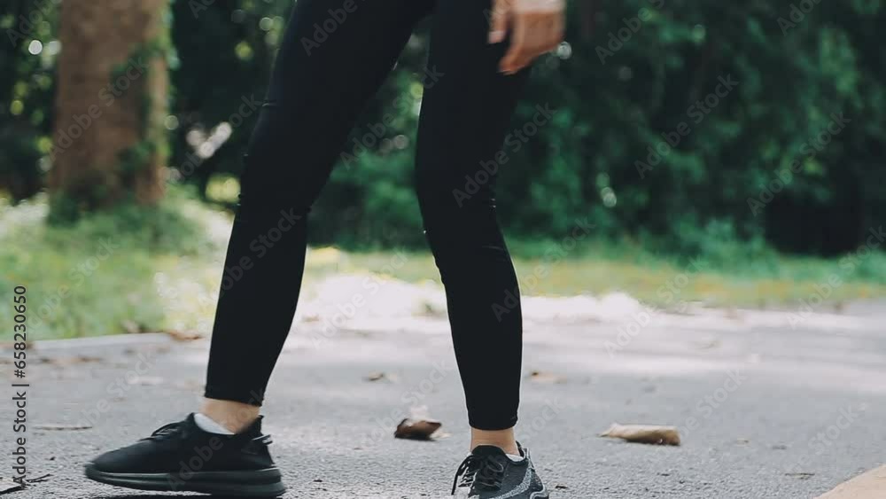 Young fitness woman runner stretching legs before run on city Young fitness woman runner stretching legs before run on city