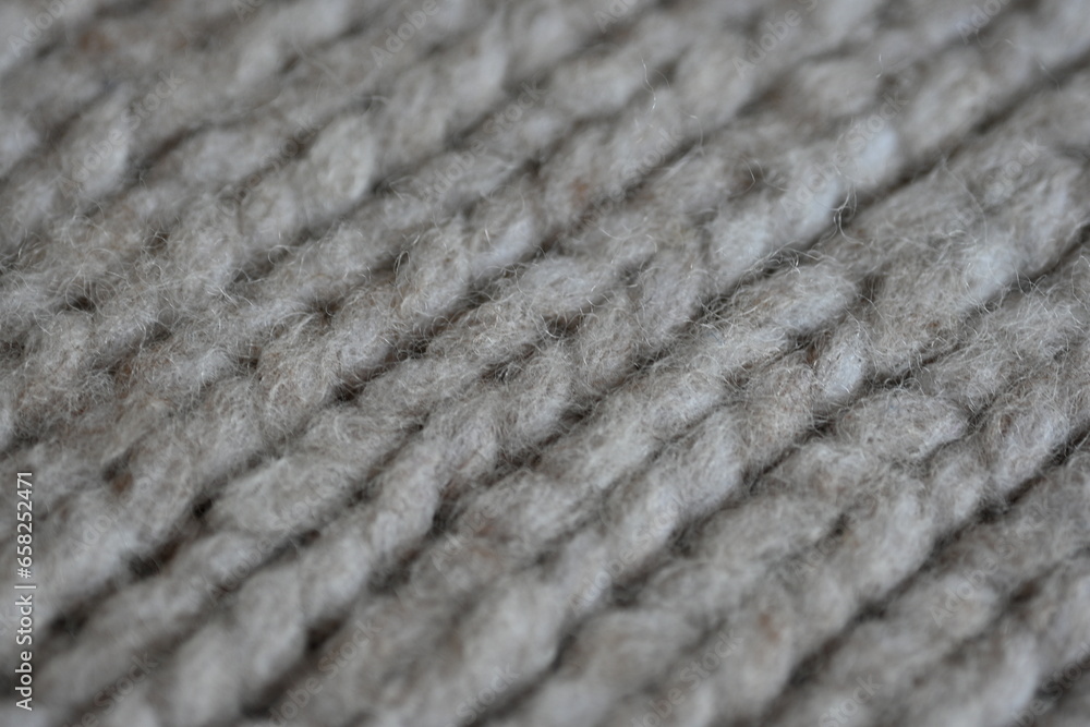 Large brown texture of face fabric as a background, knitted texture of sweater as a background Large brown texture of face fabric as a background, knitted texture of sweater as a background