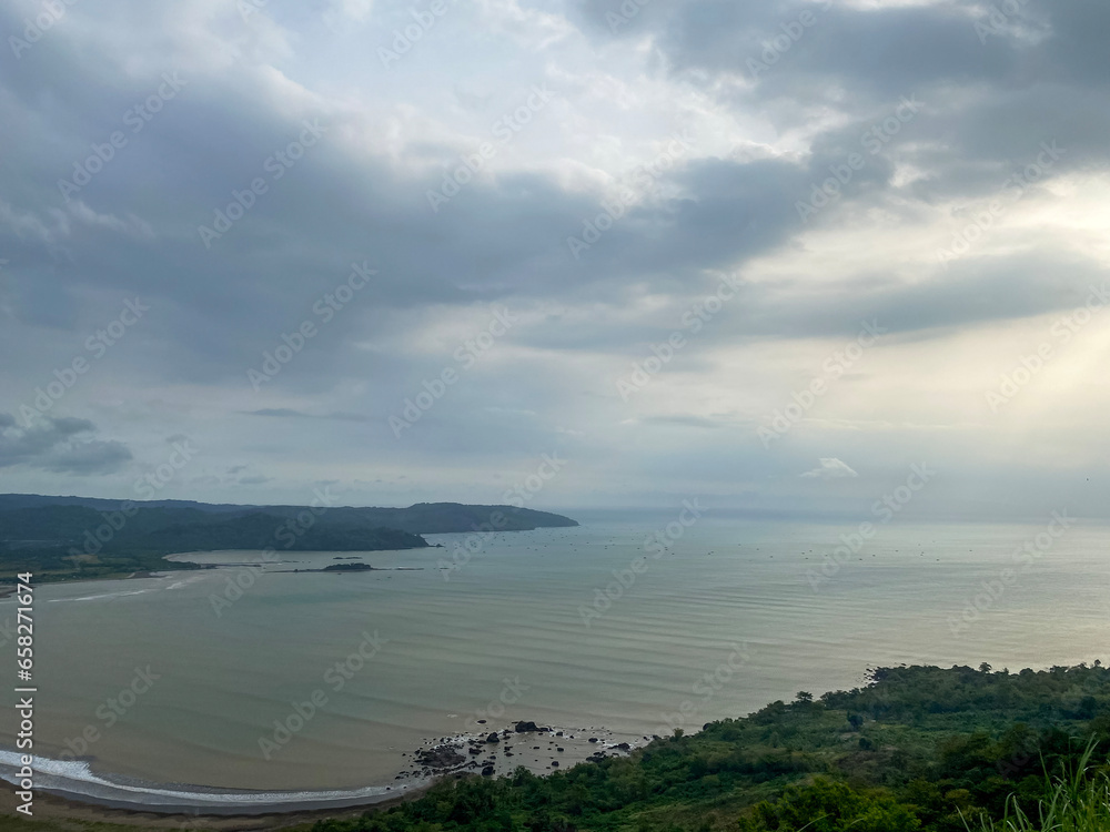 View from above, Palangpang Beach is in the Sukabumi area, to be precise, the Ciletuh Geopark, which is very close to rice fields and residentials areas.