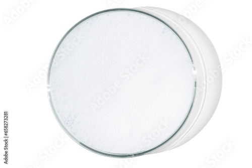 Petri dish isolated on empty background. White foam in a Petri dish.