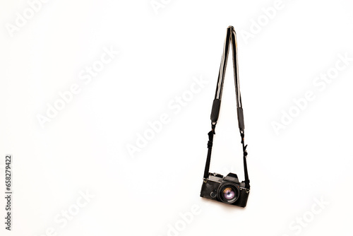 Photography Old film still camera hanging isolated white background