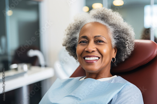 black woman smiling in dentist chair