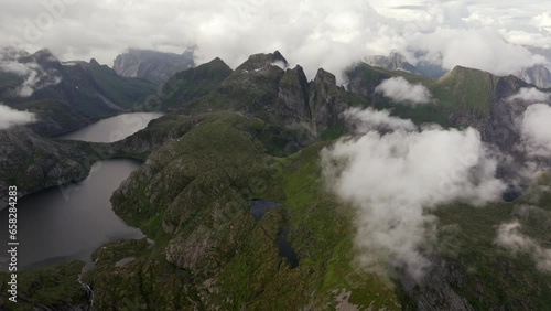 Dramatic mountains and fjords in the Lofoten Islands, Northern Norwa photo