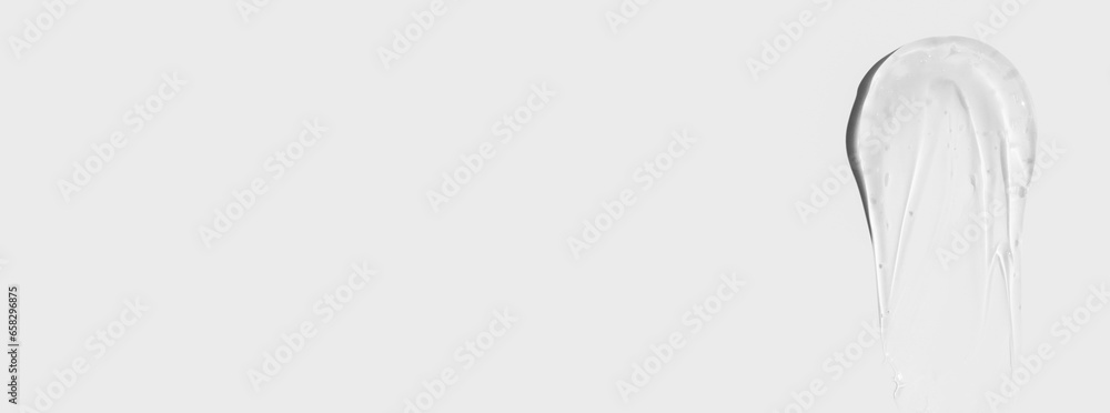 Composition of smears and drops or drops of transparent gel, serum. On a light background. Composition of smears and drops or drops of transparent gel, serum. On a light background.