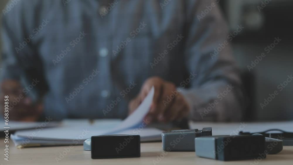attractive business asian man working with computer laptop on wooden table at home. analyzing online data to success business attractive business asian man working with computer laptop on wooden table at home. analyzing online data to success business