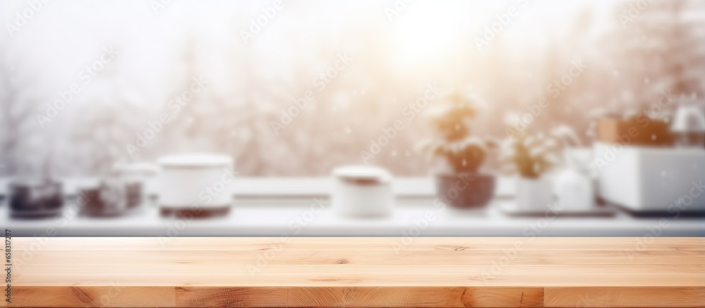 Wooden table top against blurred kitchen window background Wooden table top against blurred kitchen window background