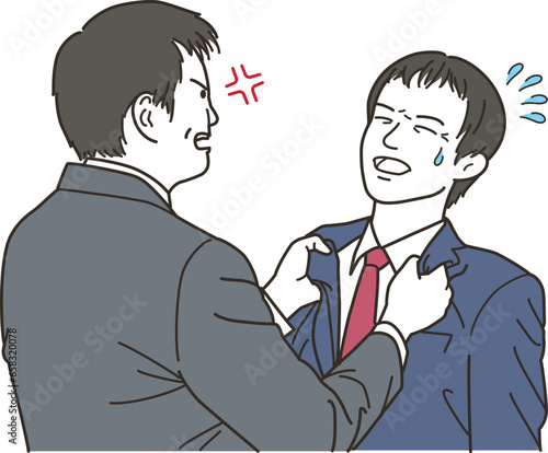 男性社員を怒る男性のビジネスマン
