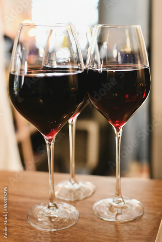 The glasses with red French wine in a restaurant