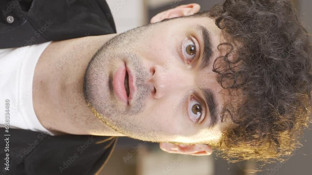 Vertical video of Young man with psychological problems.