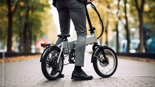 A commuter using a foldable electric bike for their daily journey to work, Mini mobility, with copy space