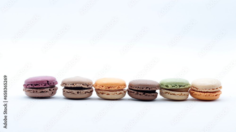 Close-up of some macarons, typical French desserts, white background Close-up of some macarons, typical French desserts, white background