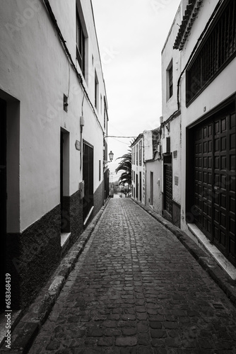 Narrow streets of the old town of Icod de los Vinos, on the northern coast of Tenerife. Canary Islands, Spain. Black and white.