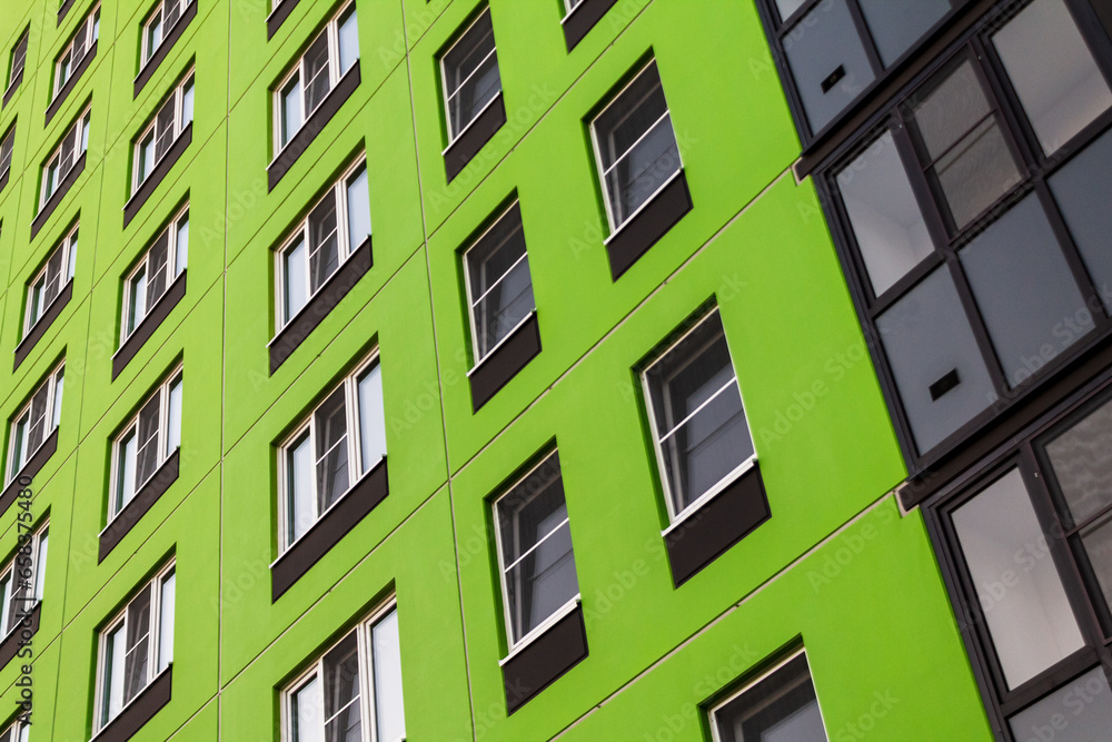 Multi-storey apartment building with apartments for living, housing rental, mortgage lending, urban housing Multi-storey apartment building with apartments for living, housing rental, mortgage lending, urban housing