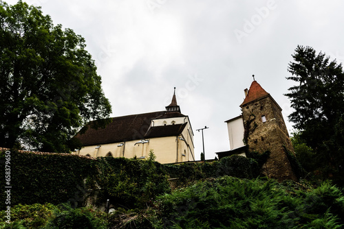 Church on the Hill and the Ropemakers tower seen from the cemetery. Sighisoara, Romania. photo