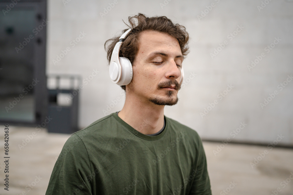 one man doing guided meditation online yoga self care concept outdoor one man doing guided meditation online yoga self care concept outdoor