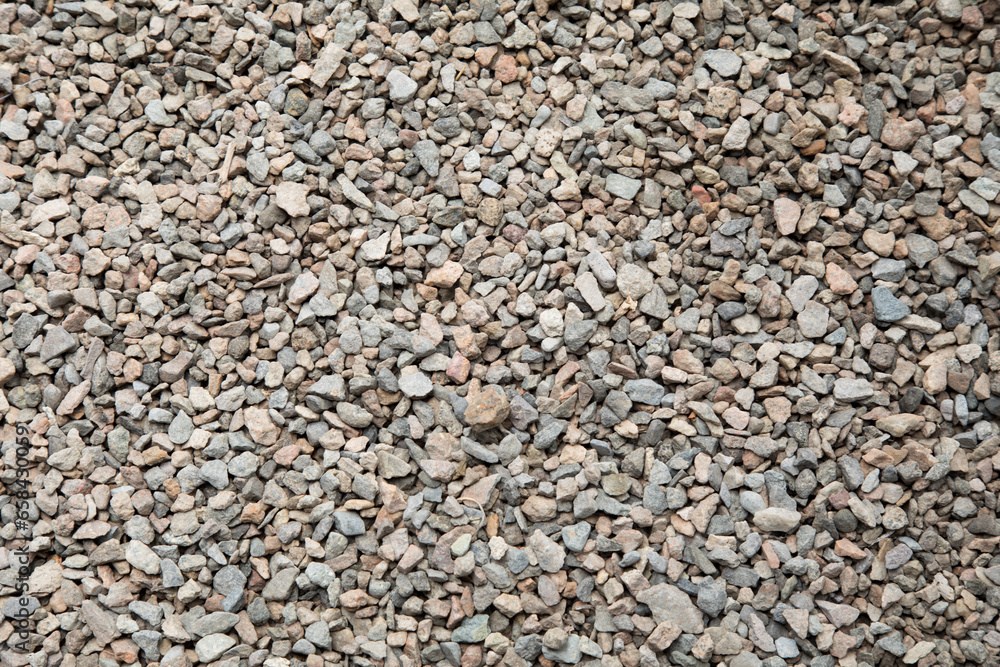 Little pebbles laying on the ground texture background Little pebbles laying on the ground texture background