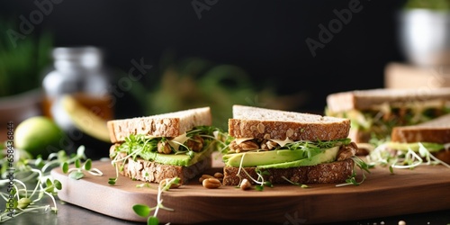 Close up of sandwiches with avocado in kitchen at home  copy space   Generative AI