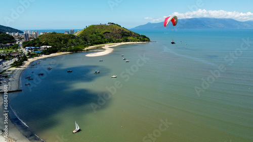 paragilider and view of the beach