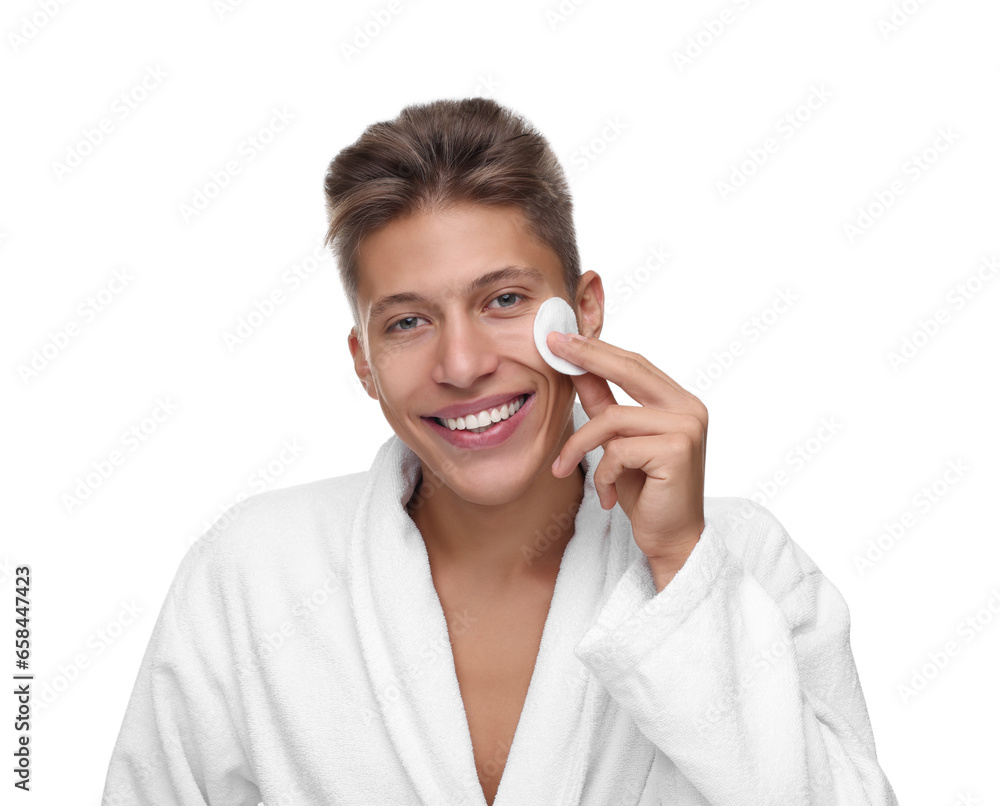 Handsome man cleaning face with cotton pad on white background Handsome man cleaning face with cotton pad on white background