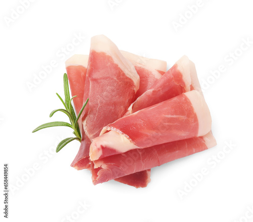 Slices of delicious jamon with rosemary on white background, top view