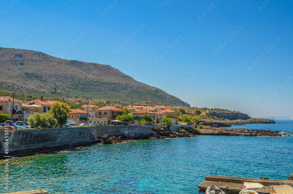 The seaside village of Trahila. Its a small coastal village and a community in the municipal unit of west Mani near Agios Dimitrios village in Messenia, Peloponnese, Greece. The seaside village of Trahila. Its a small coastal village and a community in the municipal unit of west Mani near Agios Dimitrios village in Messenia, Peloponnese, Greece.