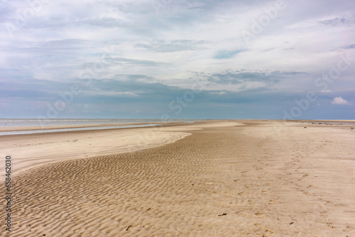 Saint Peter Ording beach impression in summer on a cloudy day, North Frisia, Schleswig-Holstein, germany