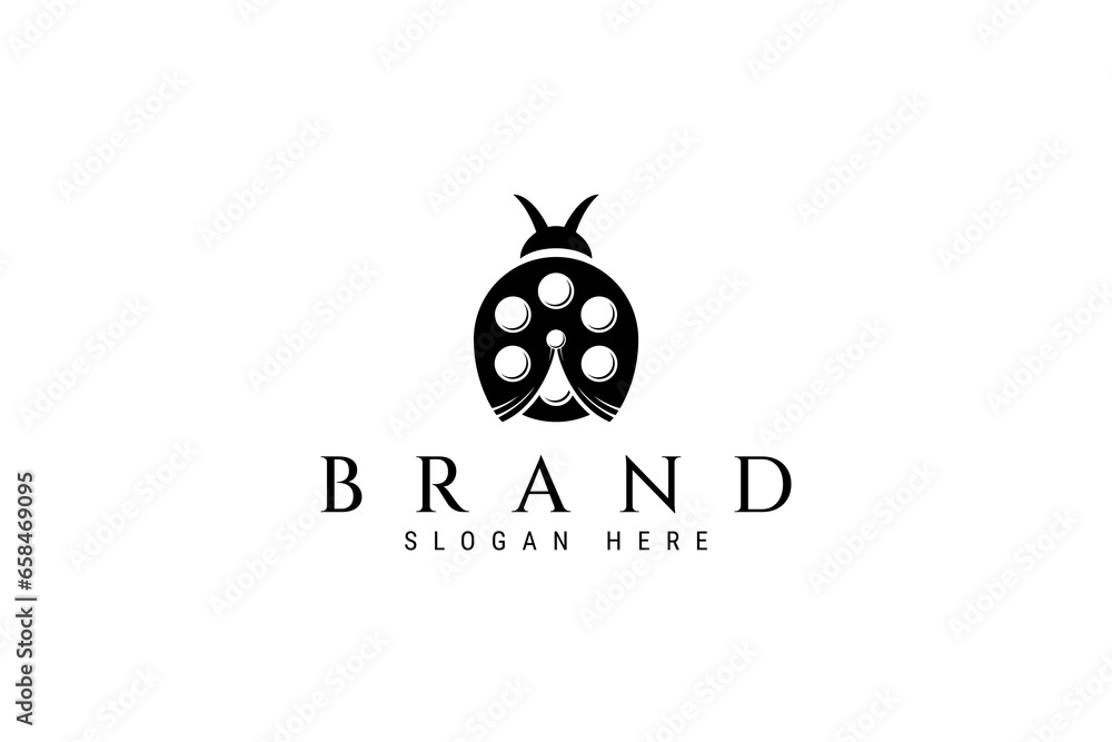 Fototapeta premium ladybug vector logo combines old film camera roll in flat design