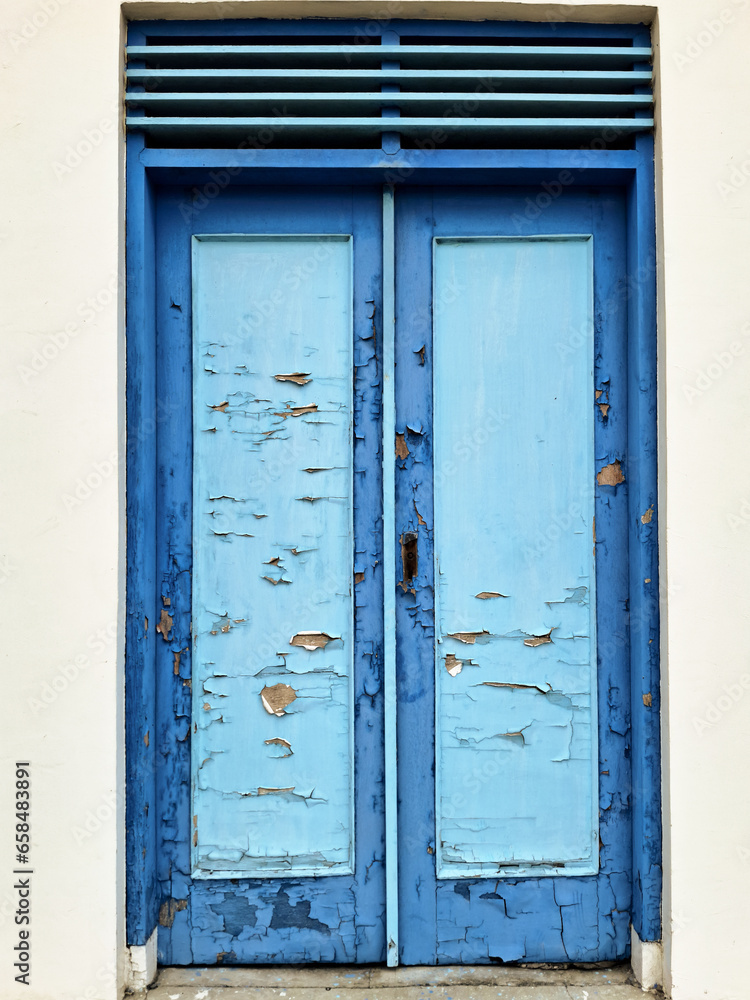 old blue wooden door chipped condition