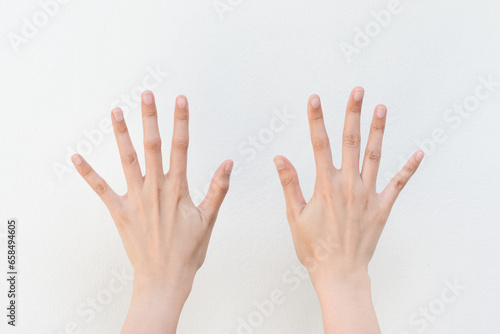 Women showing finger on white background.Counting number ten. photo