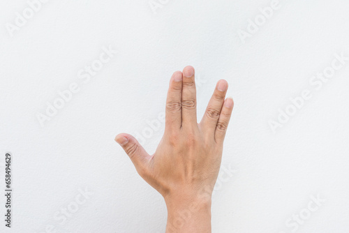 Man showing hand with sign language on white background.