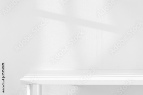 Wallpaper Mural Empty white desk with morning light and shadows of windows with copy space, summer concert. Blurred backdrop abstract background for display product. Torontodigital.ca