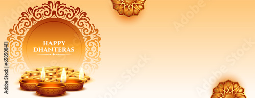 traditional and elegant happy dhanteras greeting banner with glowing diya