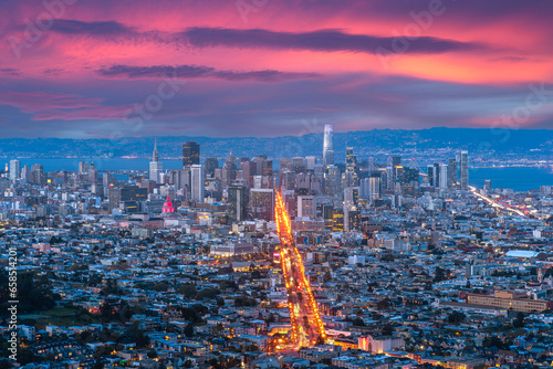 Aerial cityscape view of San Francisco in morning sunrise with high building in the city and main road