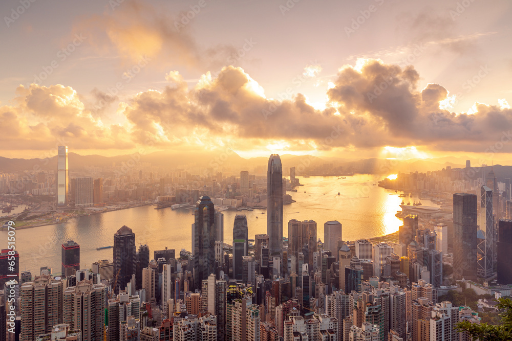 Cityscape for Hong kong city with sunset and victoria mountain