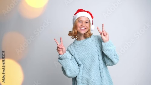 girl santa cap smile bokeh