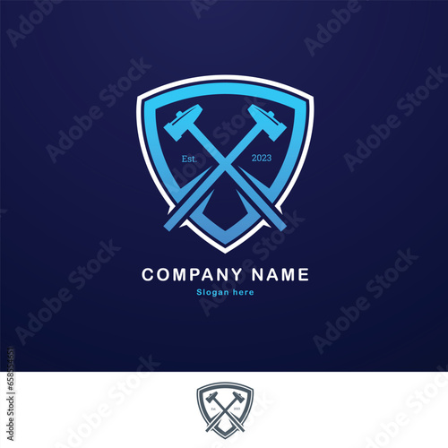 Logo of a shield with hammers inside. best for creative hard work symbol. For services like, wood working, blacksmith, Carpenter, Craftsman ect. 