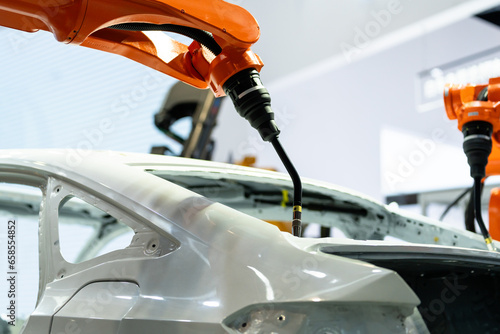 robot arm working in car factory
