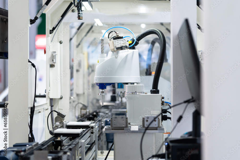 robot arm working in car factory robot arm working in car factory