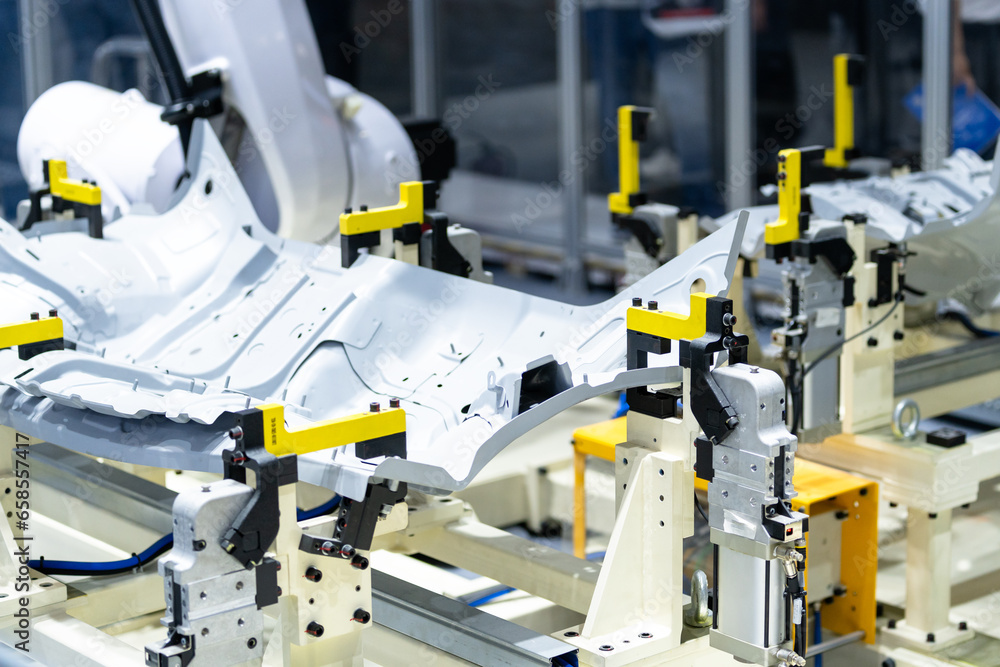 robot arm working in car factory robot arm working in car factory