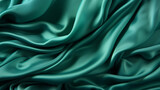 Beautiful light green blue silk satin surface. Soft folds on shiny fabric. Luxury teal background with space for text, design. Web banner. Flat lay table. Top view. Birthday, Christmas, Valentine