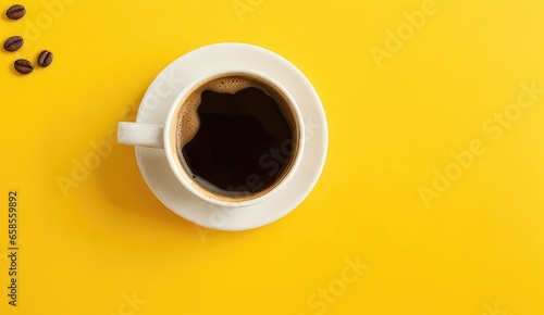 Coffee cup with a yellow background and top view. Copy space for text, advertising, message, logo