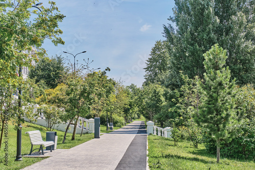 Fototapeta Naklejka Na Ścianę i Meble -  Alley with path for jogging in historical park Black Lake, Kazan, Russia.