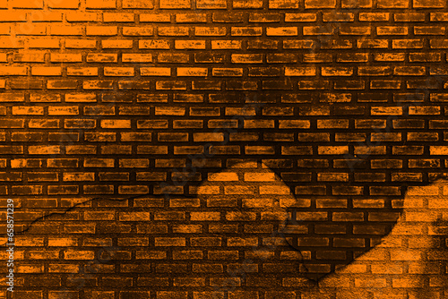Orange purple brown black old brick wall. Toned colorful grunge background. Space. Design. Cracked  broken  crumbled. Color gradient. Rough backdrop. 