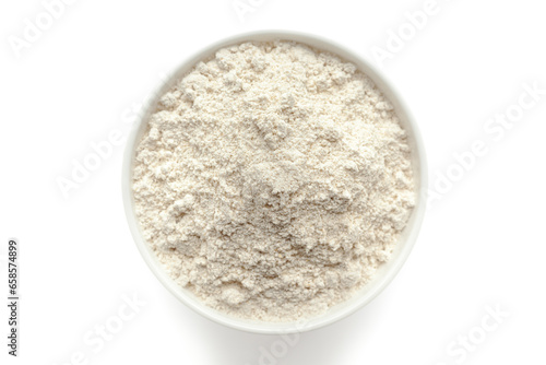Organic Sorghum Flour (Sorghum bicolor) or Jowar Flour in a white ceramic bowl. Isolated on a white background. Top View