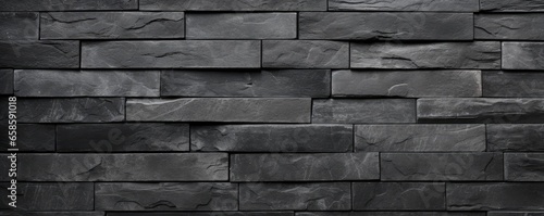 Dark grey bricks texture background for website page header photo