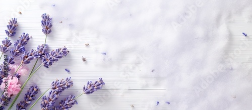 White table displaying fresh salt made from lavender isolated pastel background Copy space photo