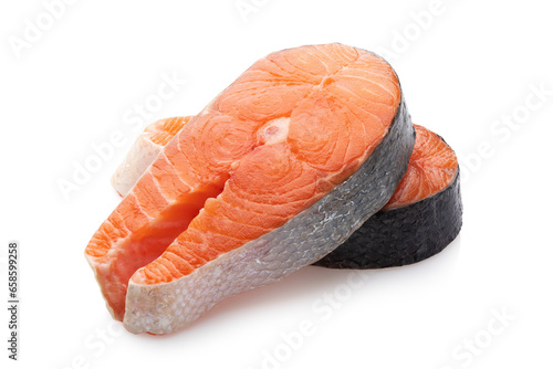 Two fresh raw salmon steaks isolated on white background, full depth of field