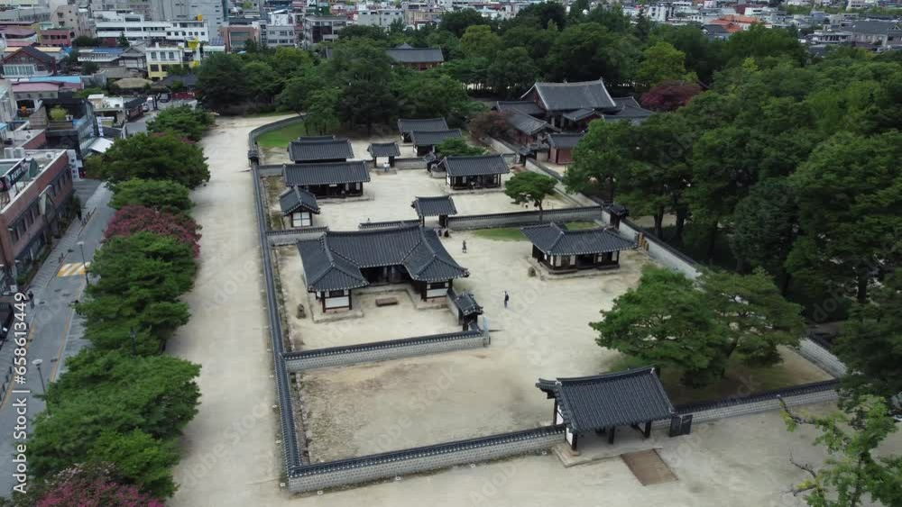 Gyeonggijeon at Jeonju Hanok Village from aerial drone view. Korean wooden traditional building of Joseon Dynasty. Gyeonggijeon at Jeonju Hanok Village from aerial drone view. Korean wooden traditional building of Joseon Dynasty.