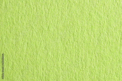 緑色の色画用紙を拡大撮影した質感のあるテクスチャー素材