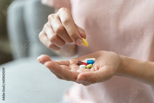 Healthcare Harmony: Close-Up Hands Holding Medication and Water Glass for Optimal Wellness, Pharmaceutical Treatment and mental health treatment